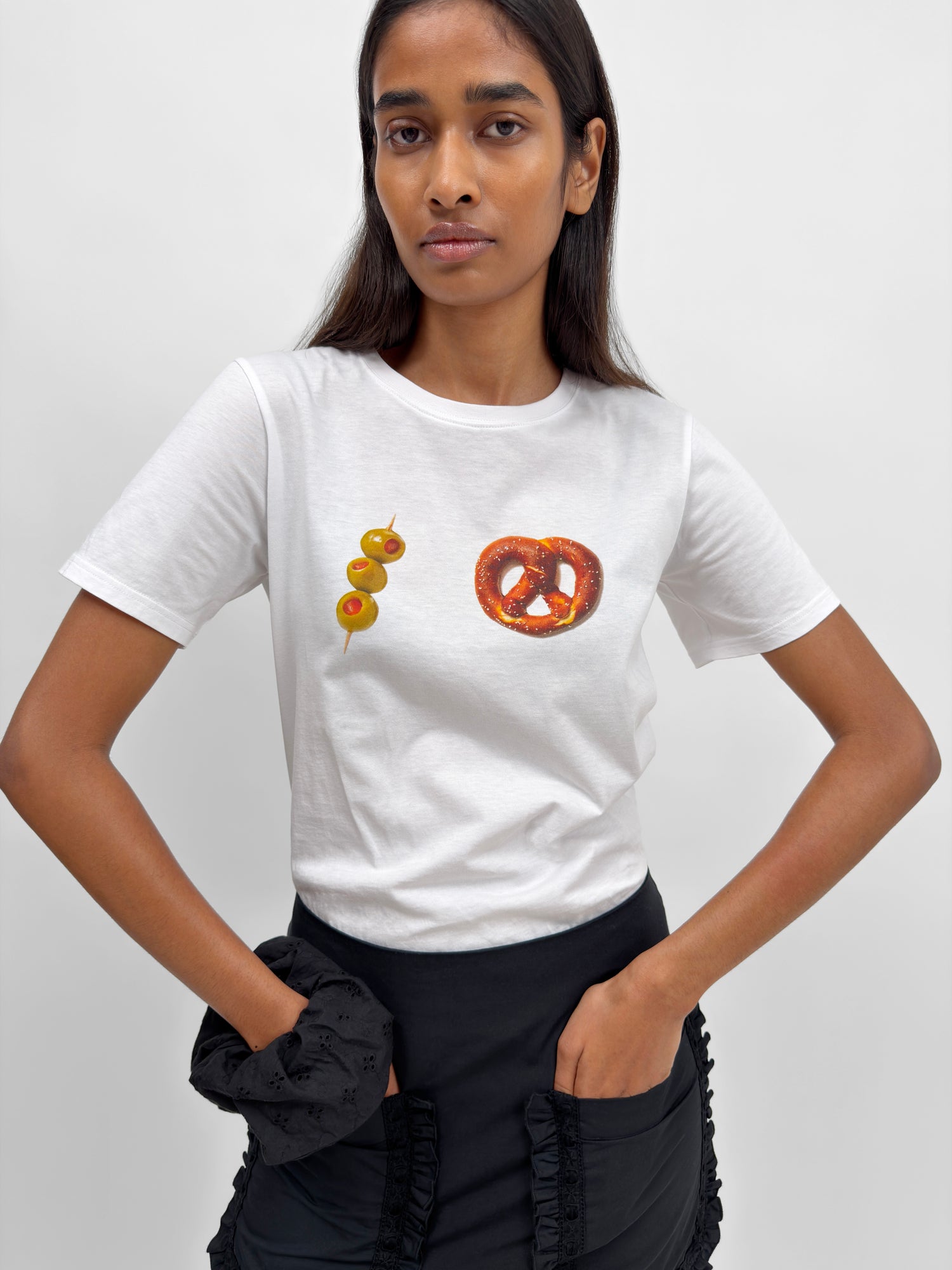 The Margot baby t-shirt with pretzel and olives print