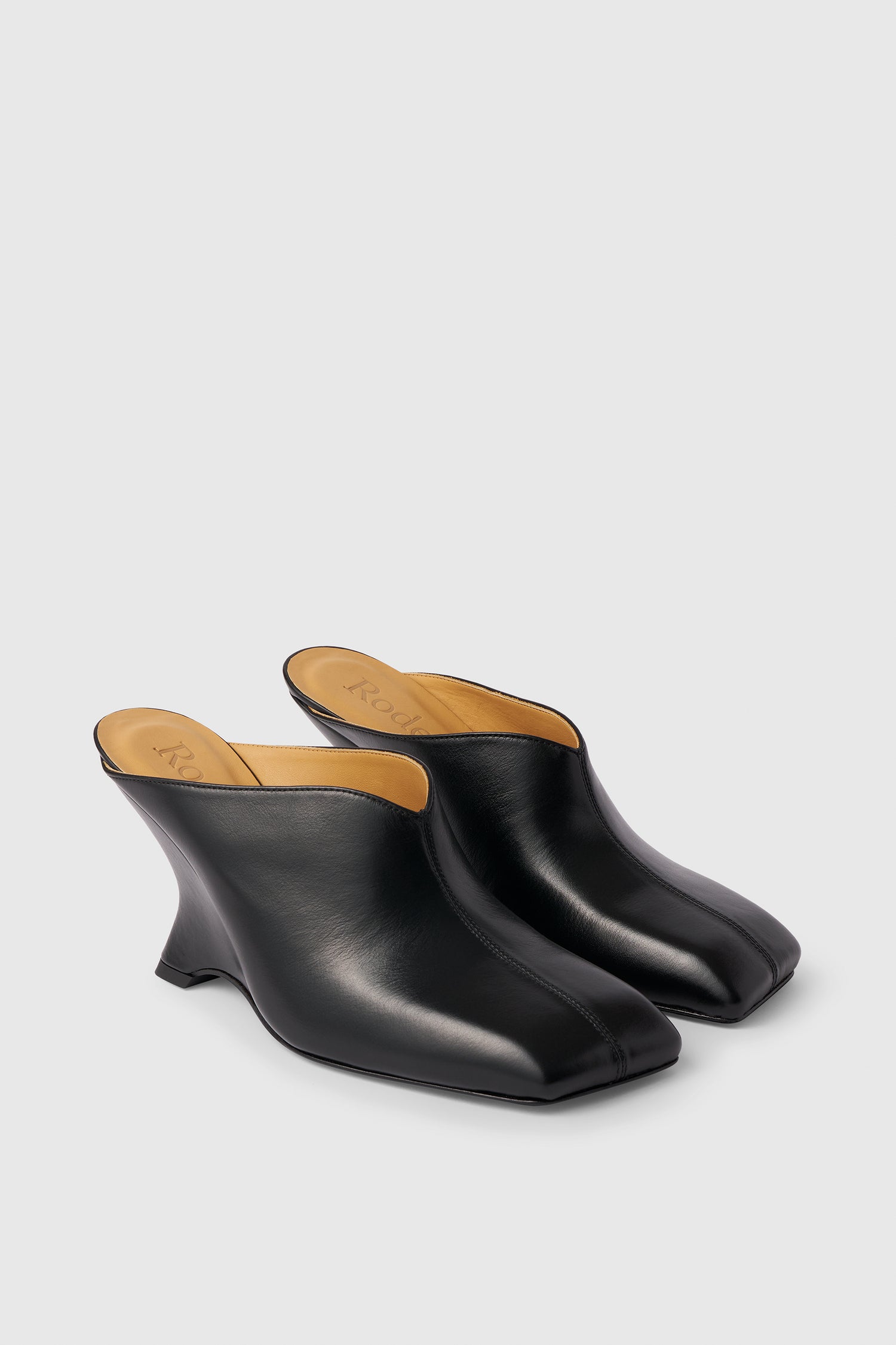The Emery wedge heels